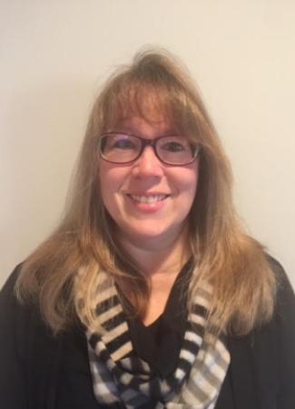 A headshot of Melanie Drolsbaugh